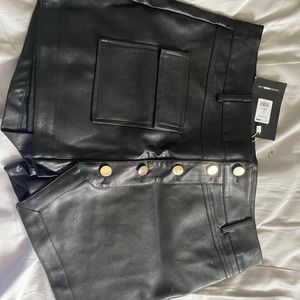 Got you on lockdown faux leather skort fashion nova